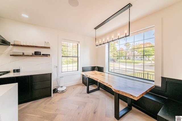 dining room with light parquet flooring