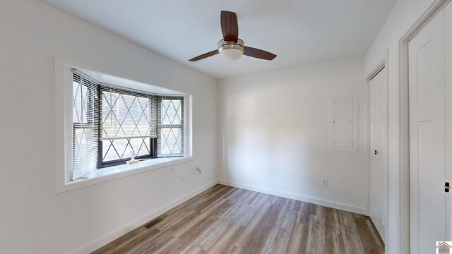 143 Castles Dr, Gilbertsville, KY 42044 - laundry area featuring light wood finished floors, a sink, baseboards, separate washer and dryer, and laundry area