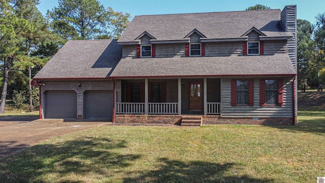 9618 Scale Rd, Benton, KY 42025 - view of front facade featuring concrete driveway, an attached garage, a front yard, and covered porch