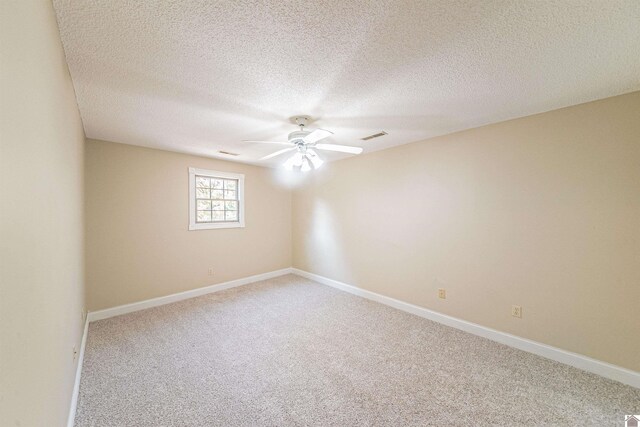 9618 Scale Rd, Benton, KY 42025 - carpeted empty room featuring ceiling fan, baseboards, a textured ceiling, and visible vents