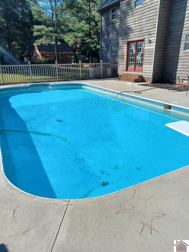 9618 Scale Rd, Benton, KY 42025 - view of pool with fence, a patio area, a fenced in pool, and a diving board
