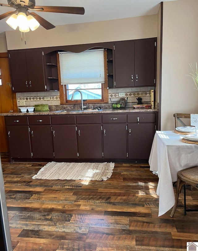 kitchen with sink, ceiling fan, dark brown cabinetry, and tasteful backsplash