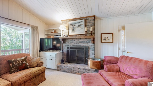 carpeted living room with wood ceiling, wood walls, vaulted ceiling, and a brick fireplace