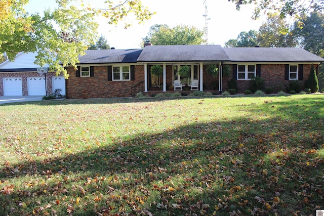 single story home with a front lawn and a garage