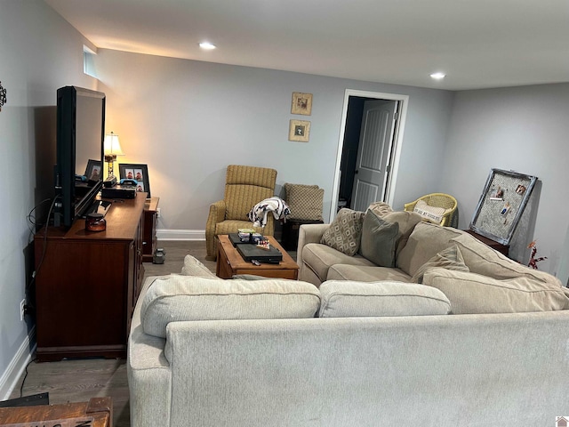 living room featuring dark wood-type flooring