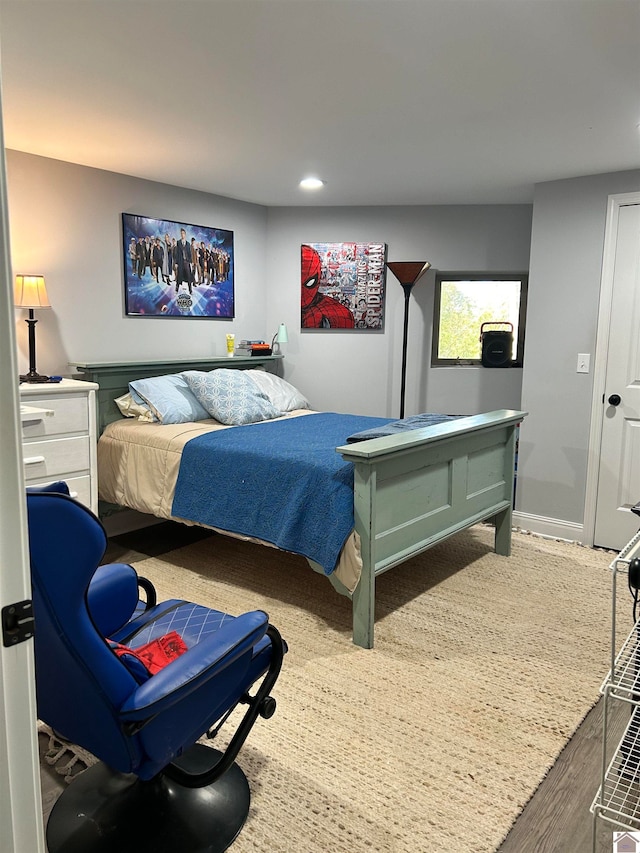 bedroom featuring hardwood / wood-style flooring