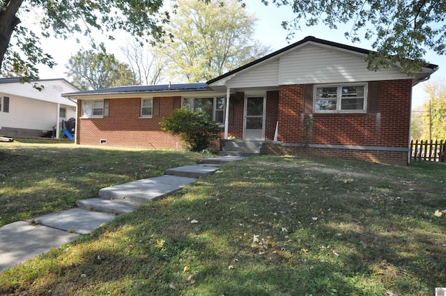 ranch-style house with a front lawn