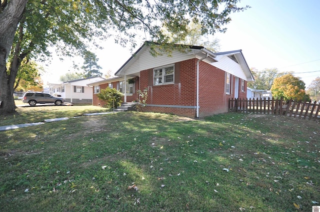 bungalow with a front lawn