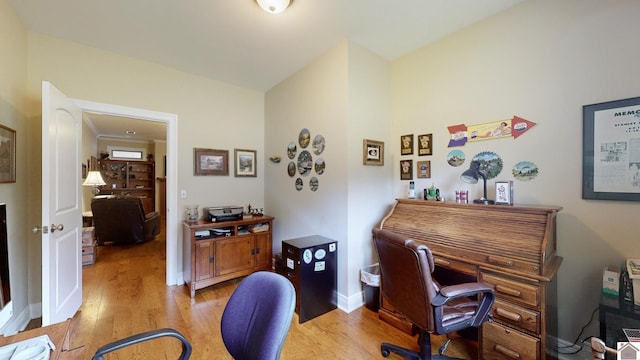 home office with light wood-type flooring