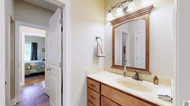 bathroom with vanity and tile patterned flooring