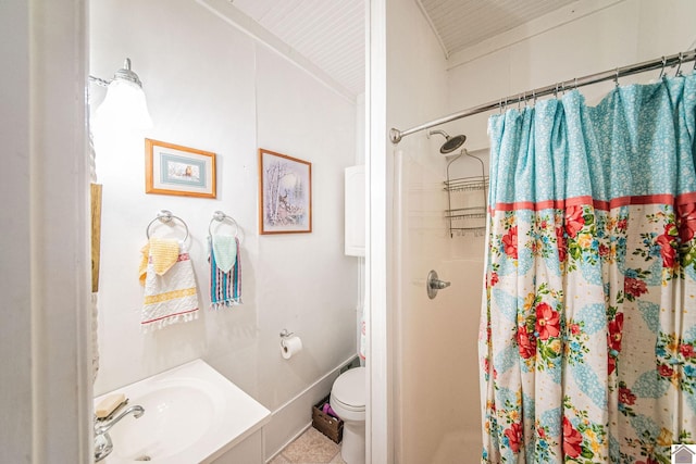 bathroom with tile patterned floors, curtained shower, and toilet