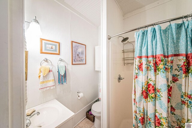 1804 Market St, Metropolis, IL 62960 - full bathroom with a shower stall, toilet, tile patterned floors, and vanity