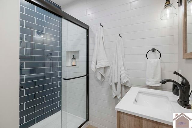 bathroom featuring vanity and walk in shower