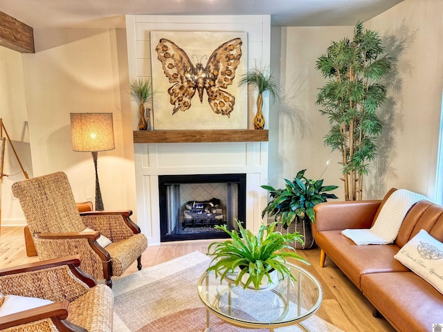 sitting room featuring wood-type flooring