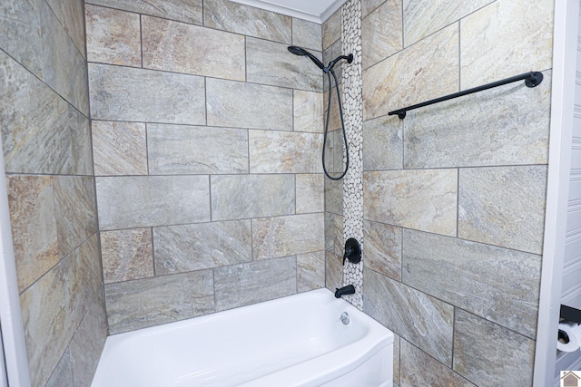 bathroom featuring tiled shower / bath combo