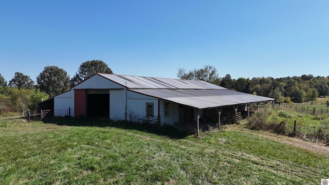 view of outdoor structure featuring a rural view