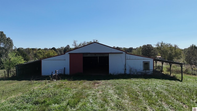 view of outbuilding with a lawn