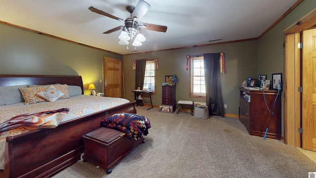 bedroom featuring light carpet, ornamental molding, and ceiling fan