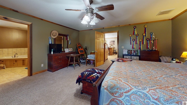 bedroom with connected bathroom, ceiling fan, ornamental molding, and light colored carpet