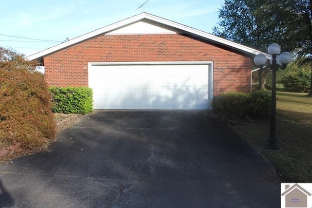 view of property exterior with a garage