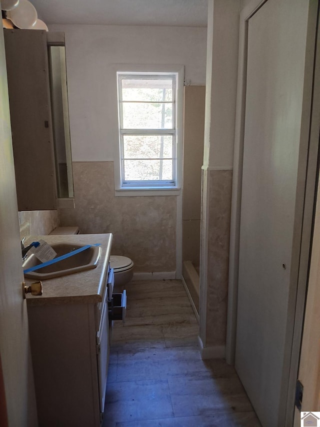 23 Piper, Clinton, KY 42031 - full bath featuring wood finished floors, toilet, a stall shower, and vanity