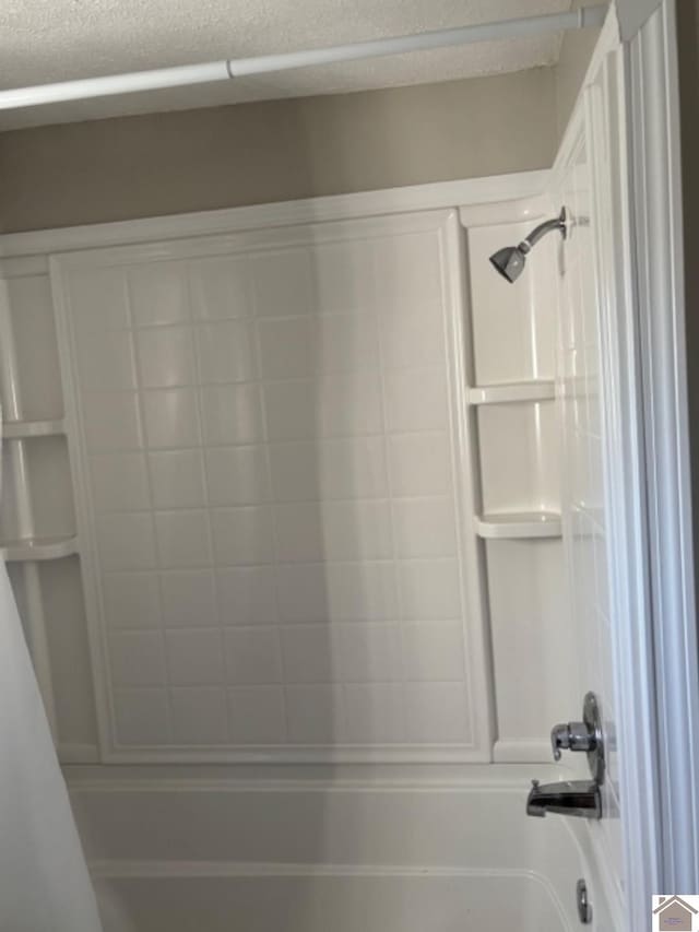 bathroom featuring shower / tub combo with curtain