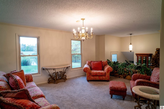 living room with a healthy amount of sunlight, a textured ceiling, and carpet