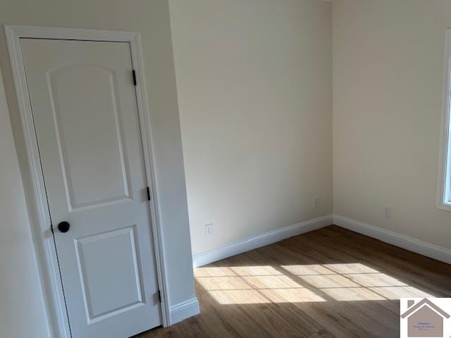 empty room with light hardwood / wood-style floors