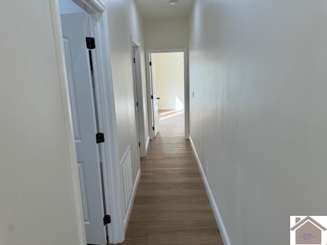 corridor featuring light hardwood / wood-style flooring