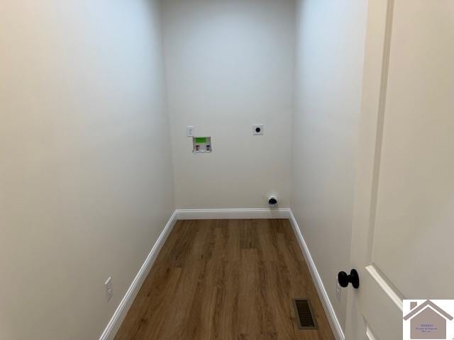 laundry area with hookup for an electric dryer, washer hookup, and dark hardwood / wood-style floors