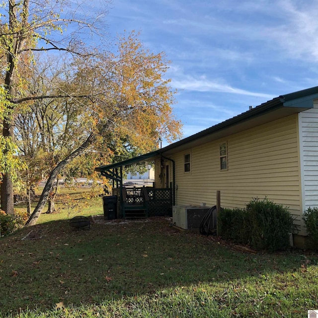 view of property exterior featuring a yard