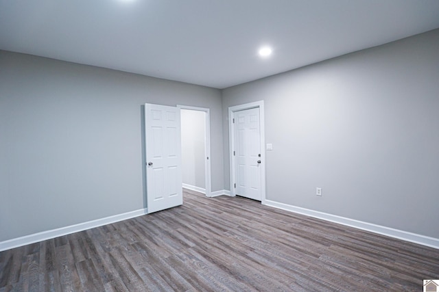 spare room featuring hardwood / wood-style flooring