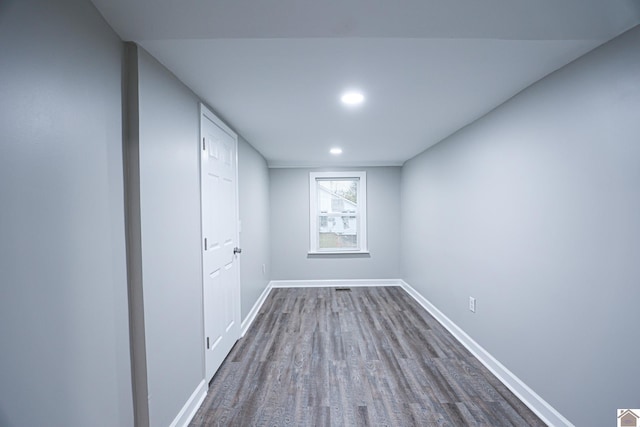 basement featuring hardwood / wood-style floors