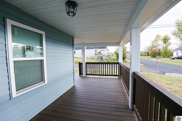 deck featuring covered porch