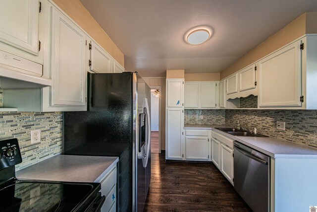 kitchen with white cabinets, black range oven, sink, dishwasher, and dark hardwood / wood-style floors