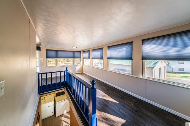 hall featuring dark hardwood / wood-style flooring