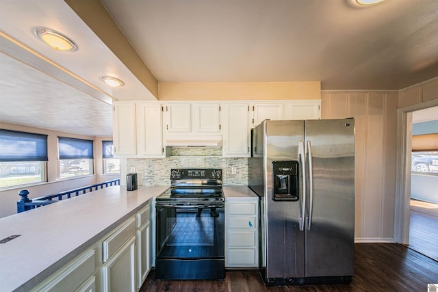 kitchen featuring white cabinetry, electric range, dark wood-type flooring, and stainless steel refrigerator with ice dispenser