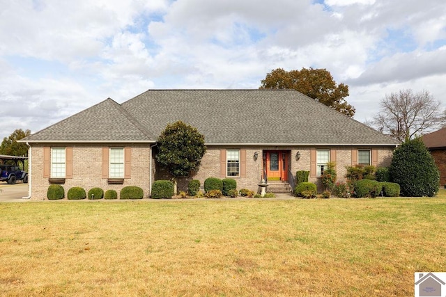 ranch-style house with a front lawn