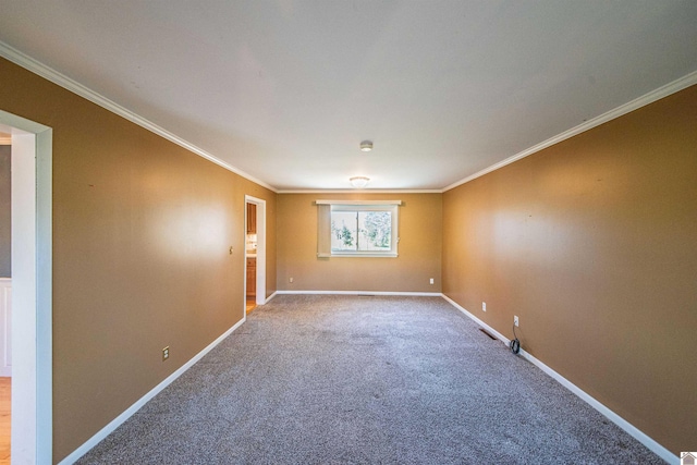 unfurnished room featuring carpet flooring and crown molding