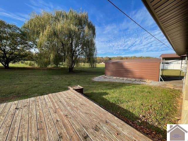 deck featuring a lawn