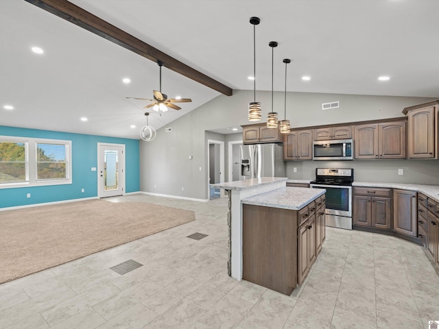 kitchen with stainless steel appliances, light stone countertops, hanging light fixtures, vaulted ceiling with beams, and a center island