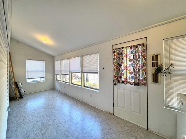 interior space featuring vaulted ceiling