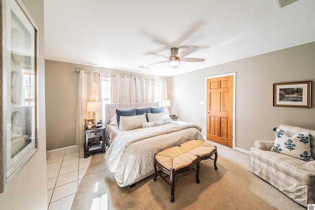 bedroom with light tile patterned floors and ceiling fan