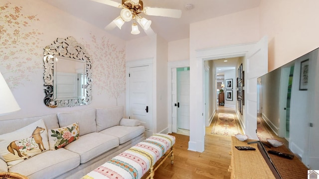 333 N 7th St Unit B, Paducah, KY 42001 - living area with light wood-type flooring, a ceiling fan, and wallpapered walls