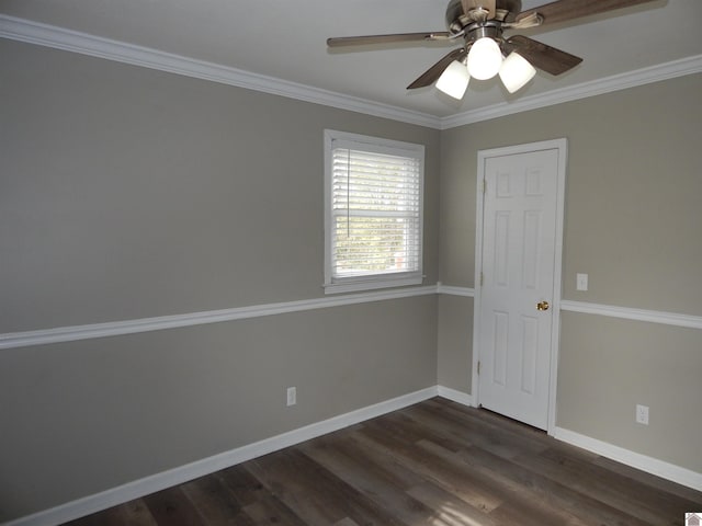 spare room with dark hardwood / wood-style floors, ceiling fan, and ornamental molding