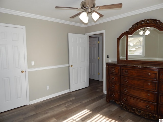 bedroom with ceiling fan, dark hardwood / wood-style flooring, and ornamental molding