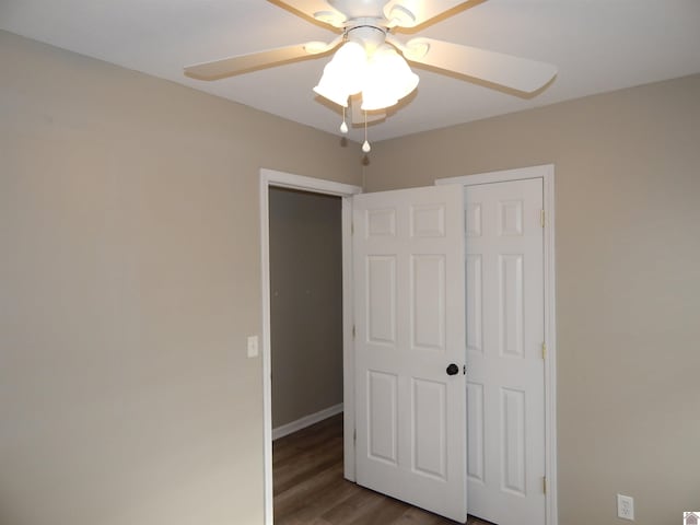 bedroom featuring a closet, ceiling fan, and hardwood / wood-style floors