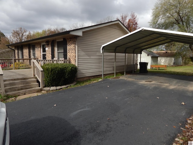 view of parking with a carport