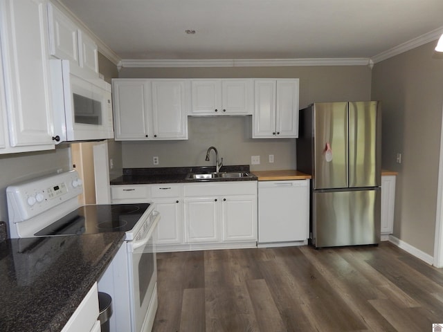 kitchen featuring dark hardwood / wood-style floors, white cabinetry, white appliances, and sink