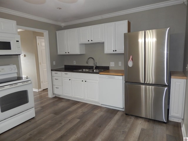 kitchen featuring dark hardwood / wood-style flooring, sink, white cabinets, and white appliances